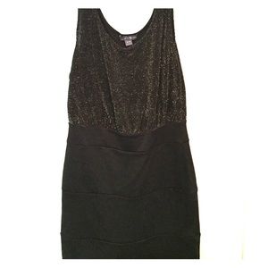 Black and gold woman’s dress